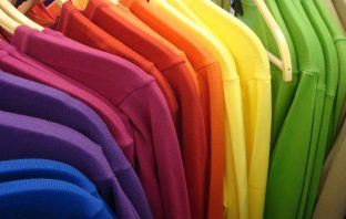 Clothes rail of coloured T-shirts