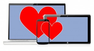 Set of electronic/online devices showing a heart. Image credit: Thinkstock
