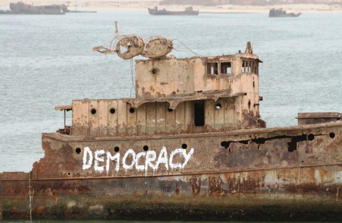 Boat with DEMOCRACY graffitti