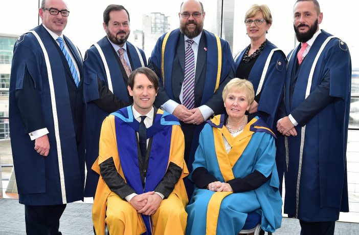 Standing L-R: John D'Arcy, Nation Director of The Open University, John Addy, Assistant Director, Professor Kevin Hetherington, Pro-Vice Chancellor, Heather Laird, Assistant Director, Simon Gregg, Student Services Manager Front Row: L-R Tim Wheeler, Doctor of the University and Catherine Bell CBE, Master of the University.