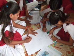 Young students learning in classroom in India