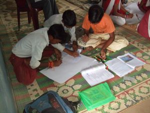 Boys working in a group during a lesson