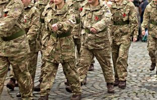 photograph of UK military personnel marching