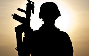 Silhouette of Afghan soldier