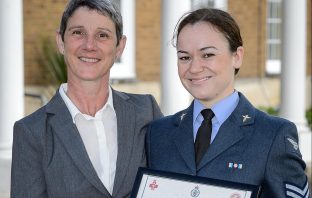 Demelza Dachtler receiving Commanding Officers Commendation with her mother, Julie