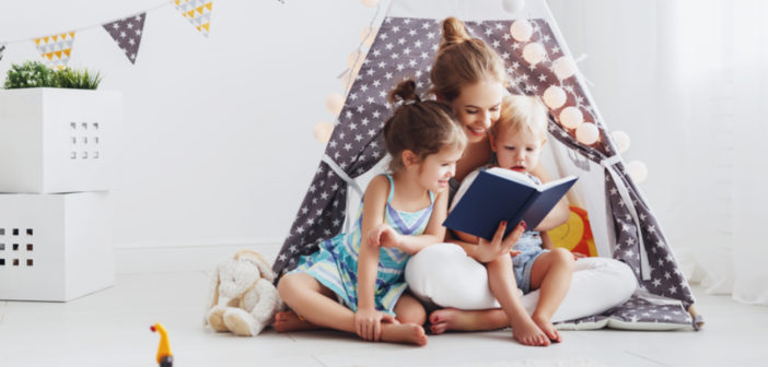 mother and children reading together