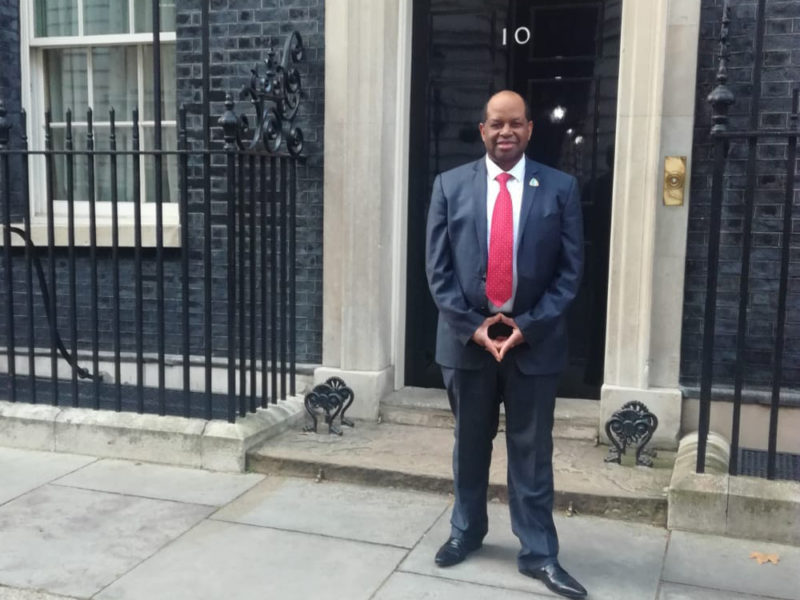 Open University Law graduate Anthony Brown, pictured outside 10 Downing Street, advocates for the Windrush Generation