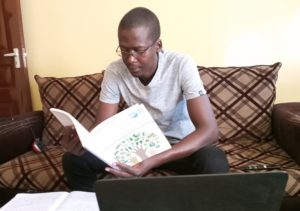 Student Kevin Odhiambo Onyango studying