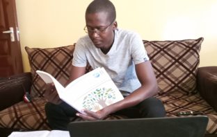 Student Kevin Odhiambo Onyango studying