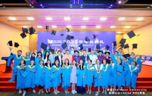 Photo shows group of Xuetangx graduates at their ceremony in China throwing their caps in the air