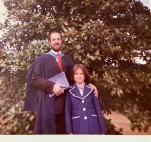 Alan and his daughter at graduation ceremony 50 years ago