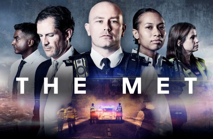 Image shows four Metropolitan Police Officers with the words 'The Met' written across the middle of the image