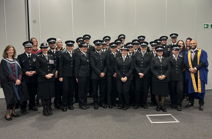 Image shows group of 29 North Yorkshire Police apprentice graduates in their uniform