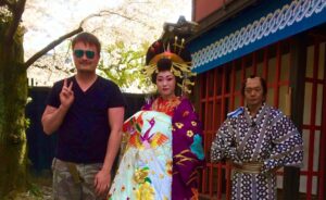Martyn in Japan with a geisha